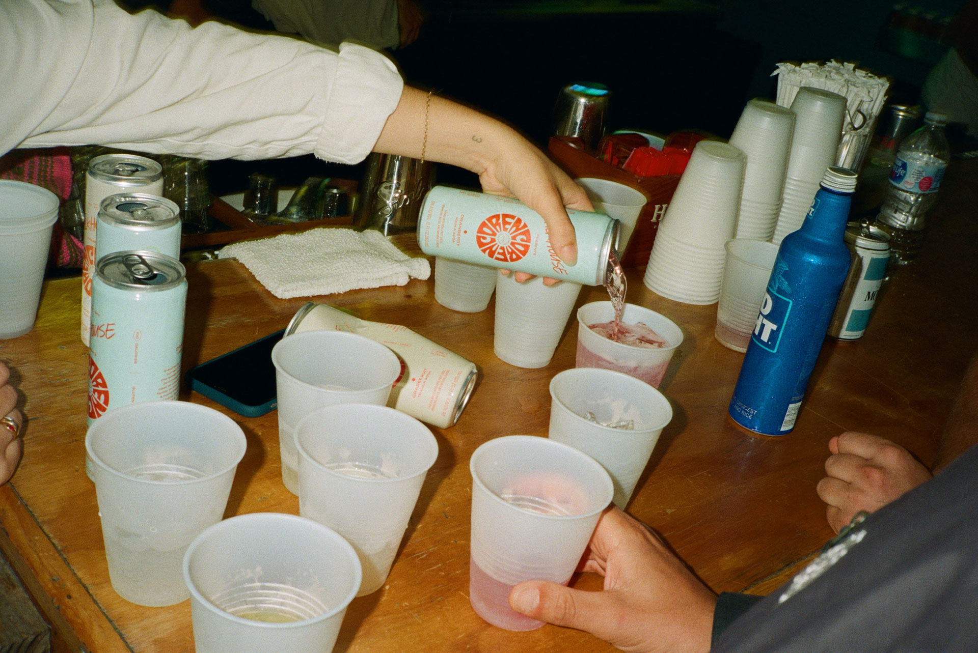 A lively bar scene at Encore, setting the mood for the Hamptons spirit.